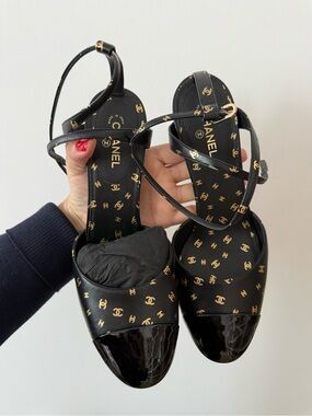 CHANEL Black & Gold Logo Strappy Cap-Toe Heels